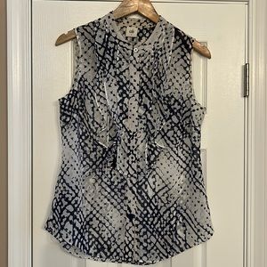CAbi button down navy and white sheer sleeveless shirt with ruffle front.